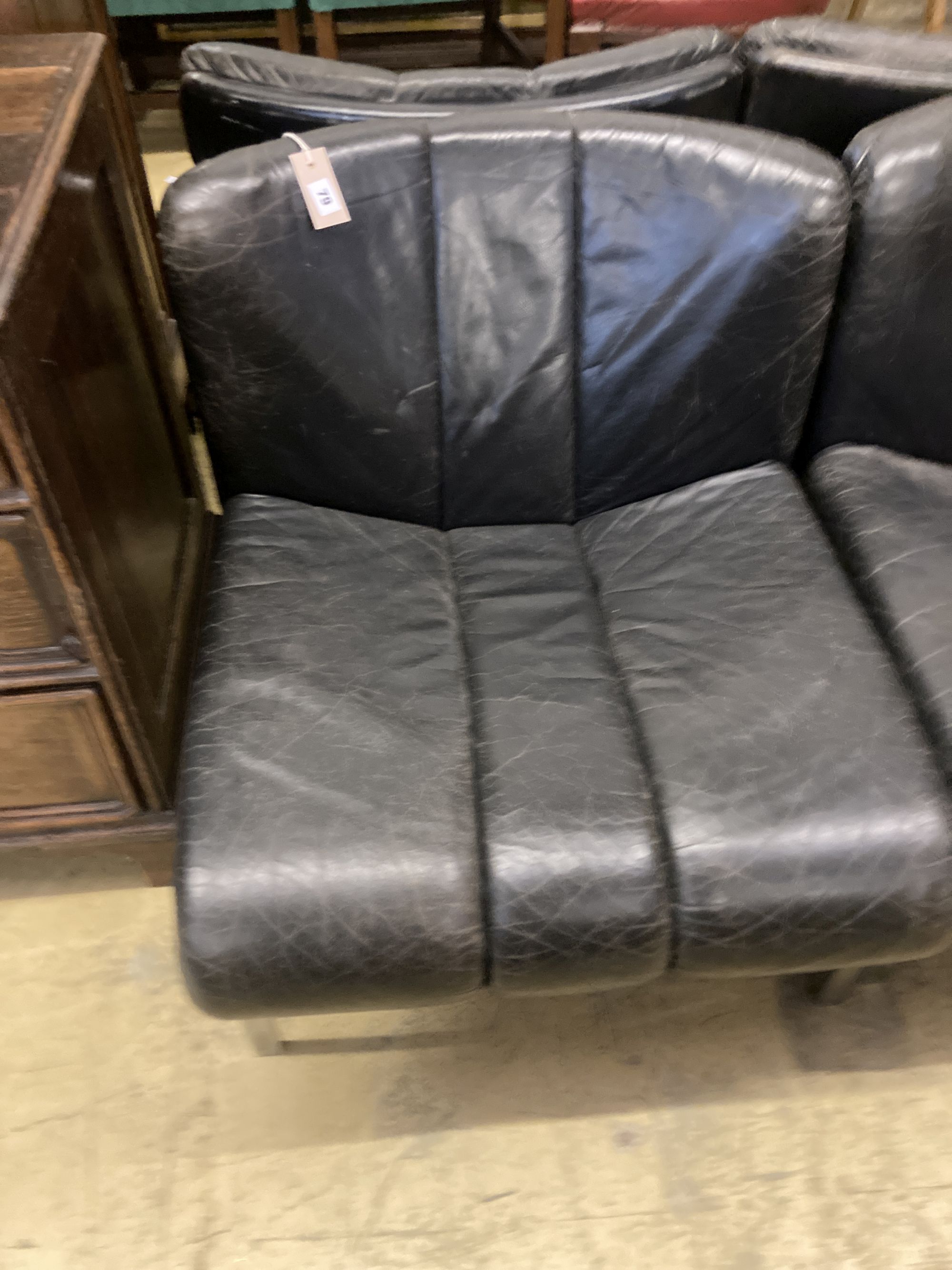A set of five mid century black leather and chrome banquette chairs, width 65cm, depth 70cm, height 68cm